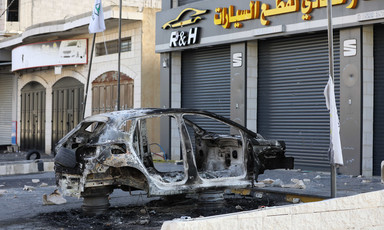 The remains of a car that has been attacked 