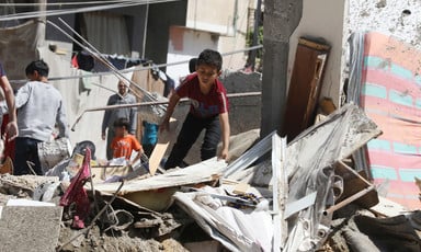 A body in the remains of a house attacked by Israel in Gaza 