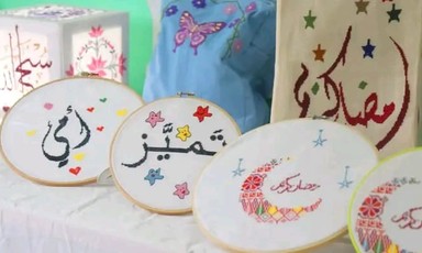 Colorful plates and other items on display in a Gaza shop 