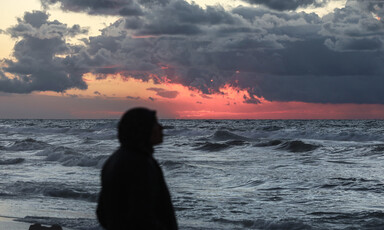 The sun sets over the sea off Gaza