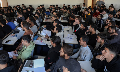 A hall crammed with students