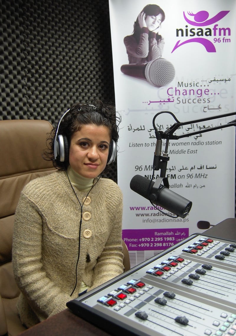 Nisreen Awwad sits in recording studio