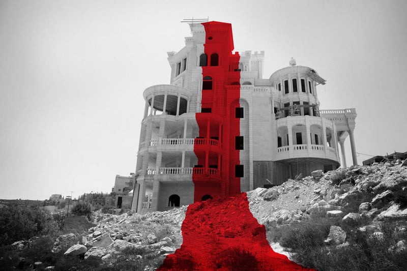 A black and white image of an unfinished building with a red line superimposed on it