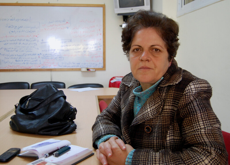 Khitam Saafin at a conference room table