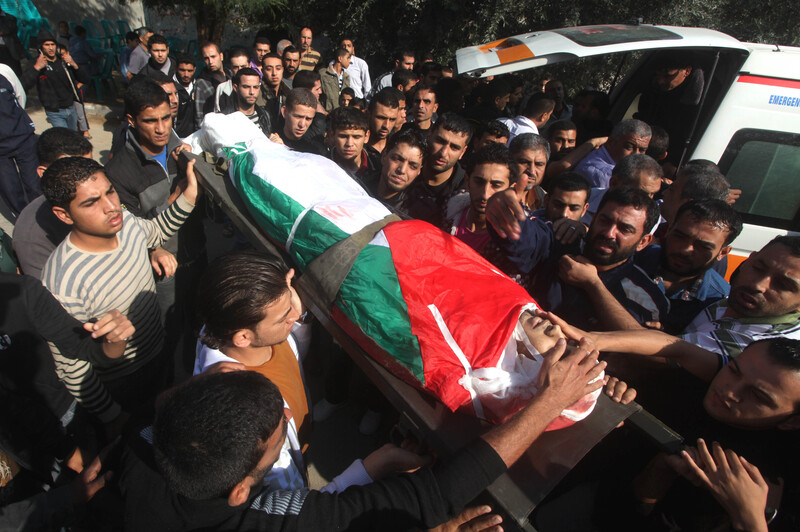 In photos: Palestinians in Gaza celebrate victory, mourn those lost ...