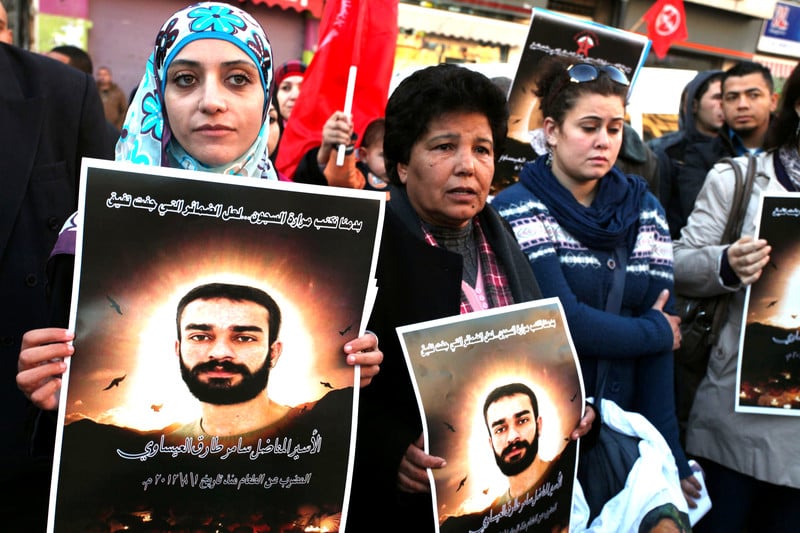 Shireen Issawi (left) at a Ramallah protest in support of her brother Samer