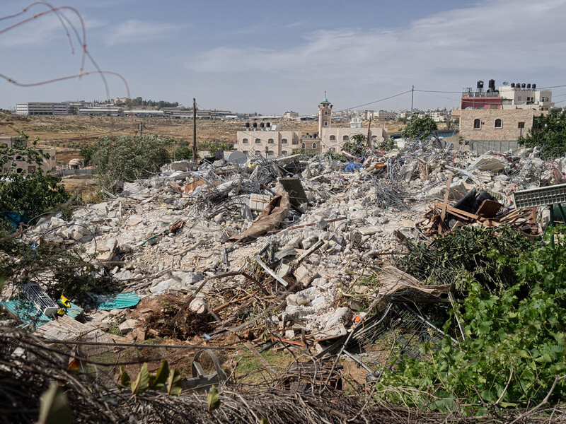 View of rubble of destroyed two-story home