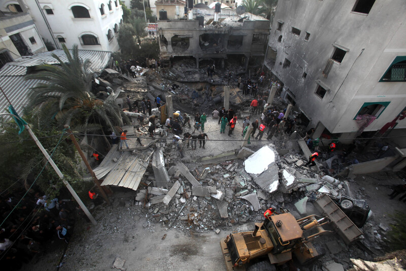 Aerial view of rescue workers at scene of leveled building