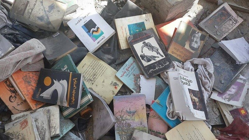 Burned books from the collection of Palestinian poet Othman Hussein