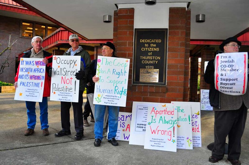 People holding signs