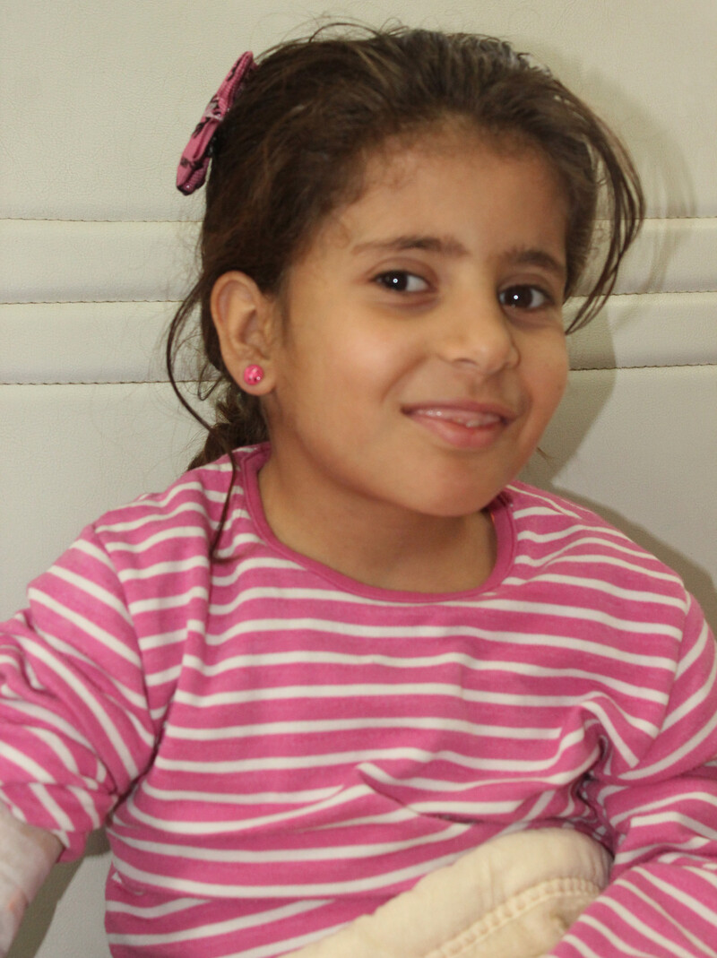 Close-up of smiling young girl