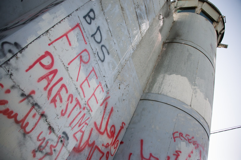 Graffiti reading BDS and Free Palestine is seen on Israel&#039;s concrete wall in West Bank