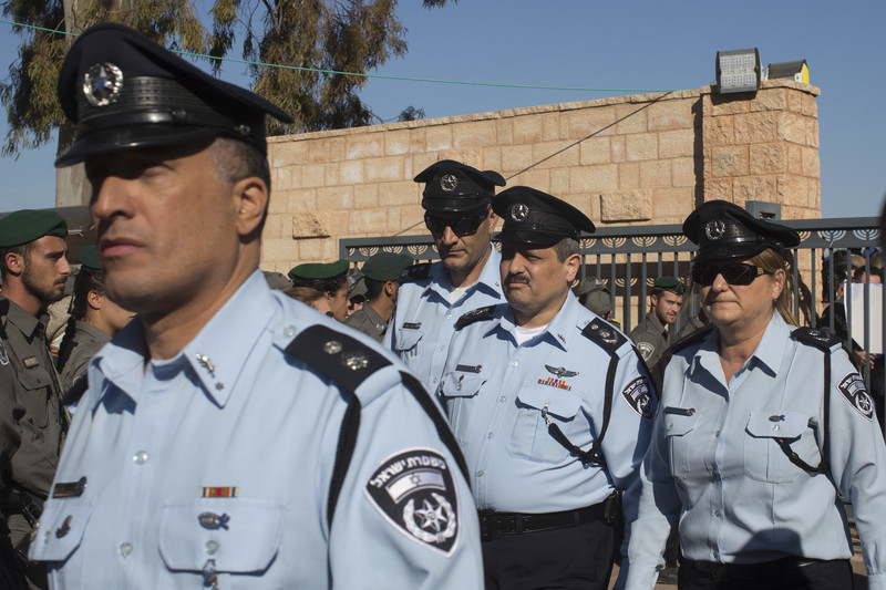 Four uniformed Israeli police officers
