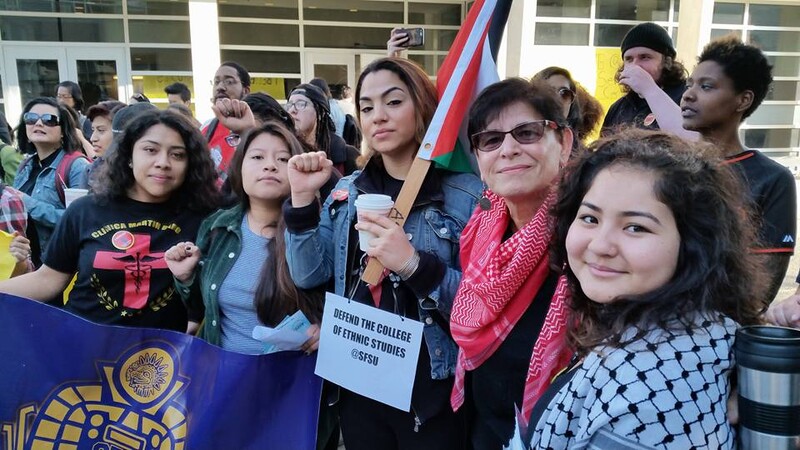 Professor Rabab Abdulhadi stands with student supporters at San Francisco State University.