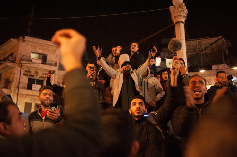 Demonstrators against a new Palestinian social security law chant slogans at Ramallah's central Manara Square