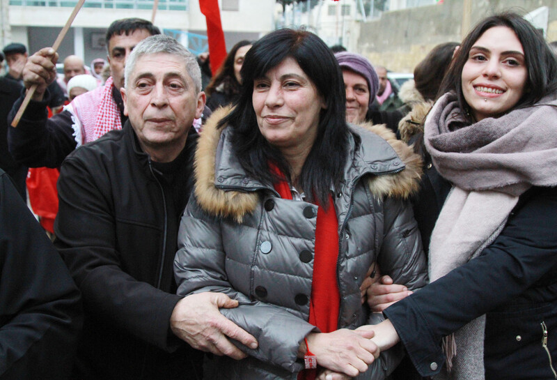 Khalida Jarrar surrounded by supporters. 