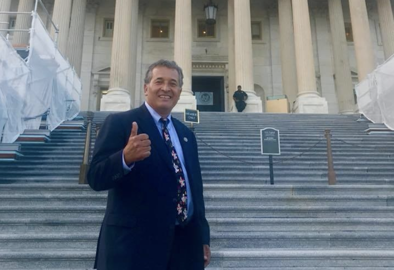 Congressman Juan Vargas gives thumbs up signal in front of US Capitol Building 