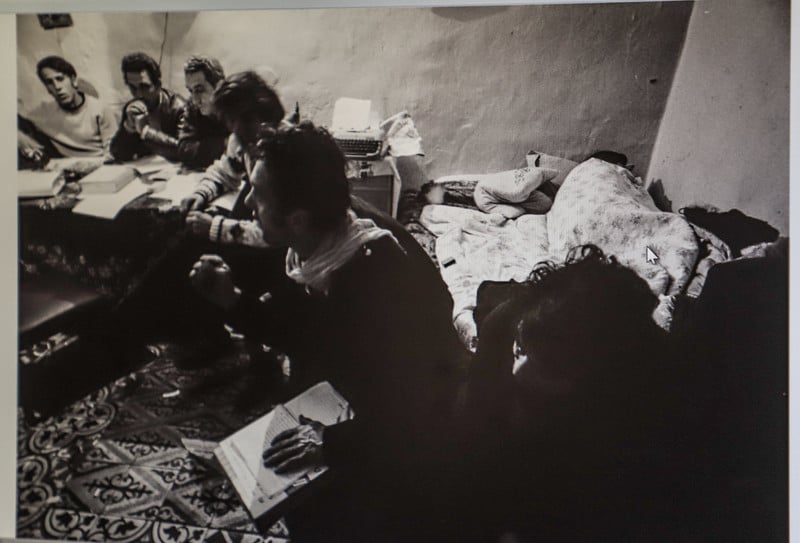 An old black and white photo shows young panthers meeting in Abergel's house in Musrara, the area where the group was founded. The room is small and there is a bed behind one of the group who appears to be speaking