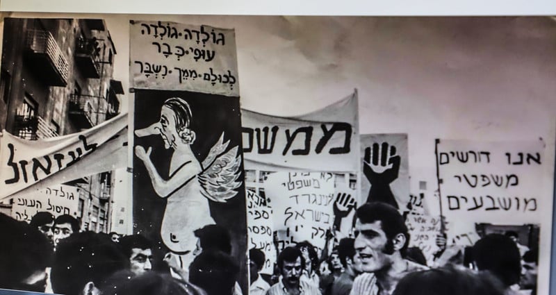 A black and white poster displayed by the Black Panther carries a caricature of Israel's then prime minister Golda Meir. The caption read: “Golda, Golda / Fly away / We’ve had enough of you”. 