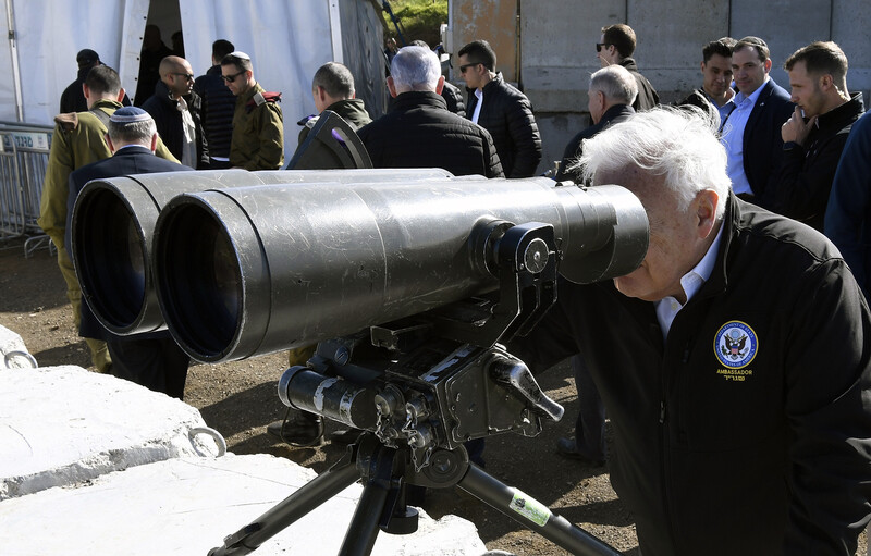 Man uses enormous binoculars