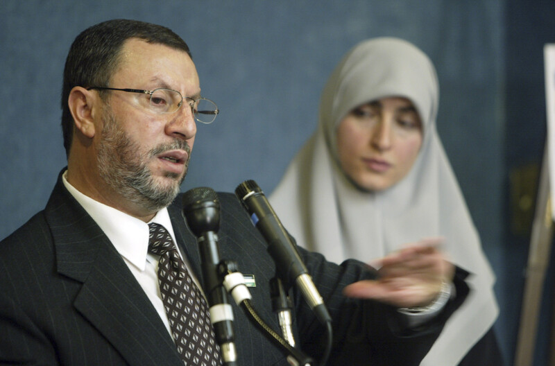 A man and woman at a podium