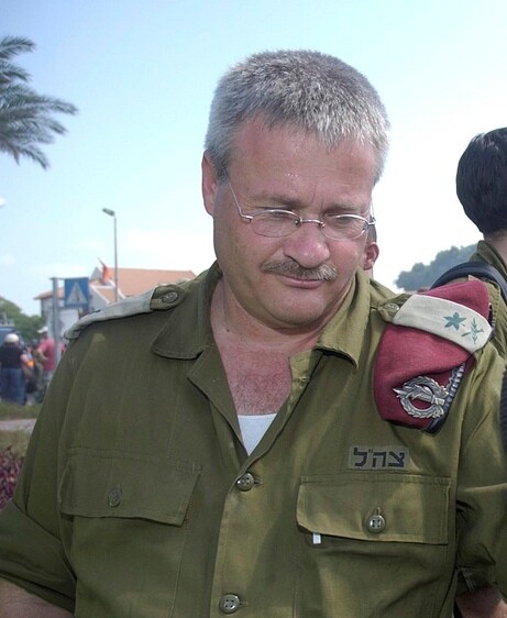 A man in a military uniform from the chest up