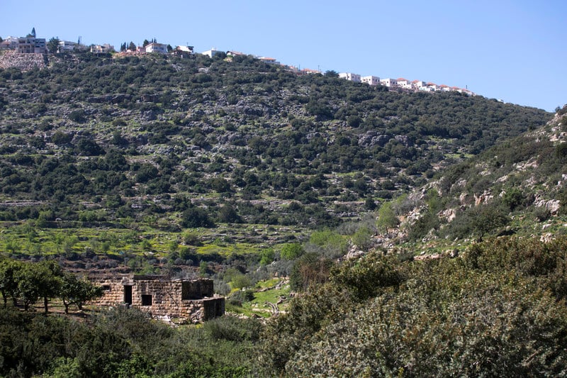 A settlement above a farm house
