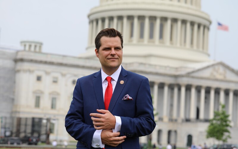 Man poses outside US Capitol Building