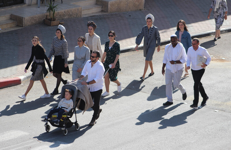 An aerial view of a group of people walking