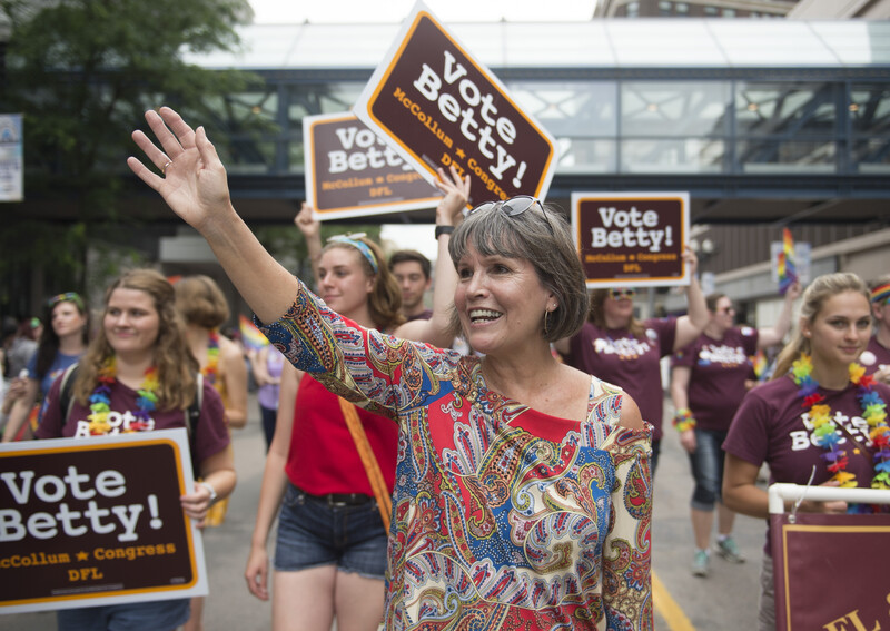 Woman marches in parade