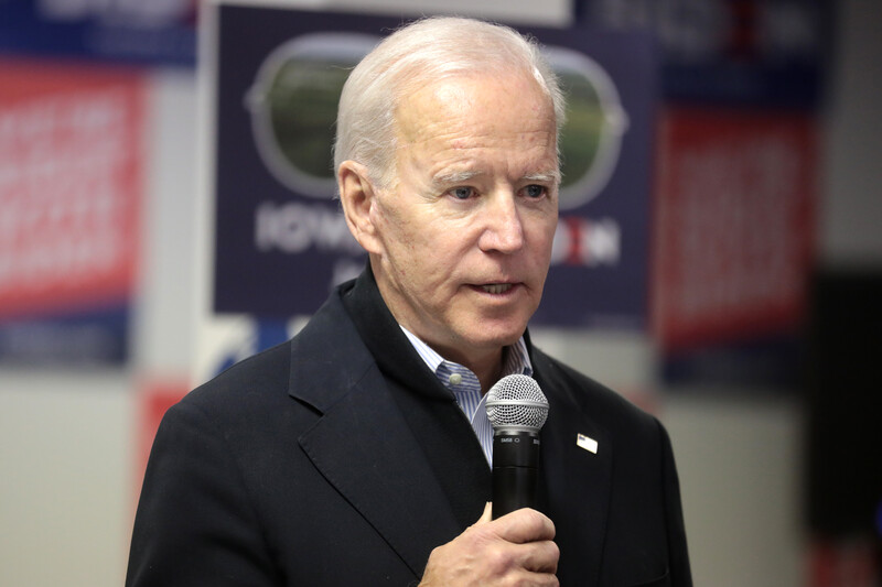 Man holds microphone