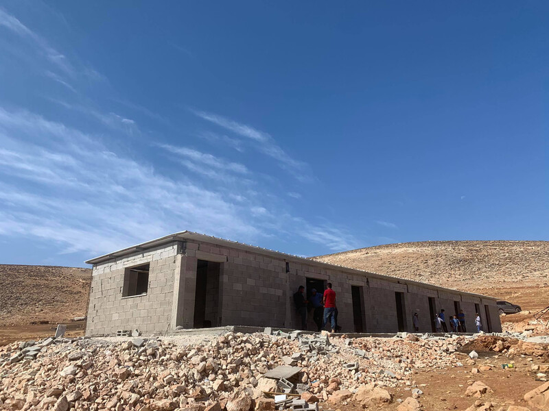 One story building with no doors or windows