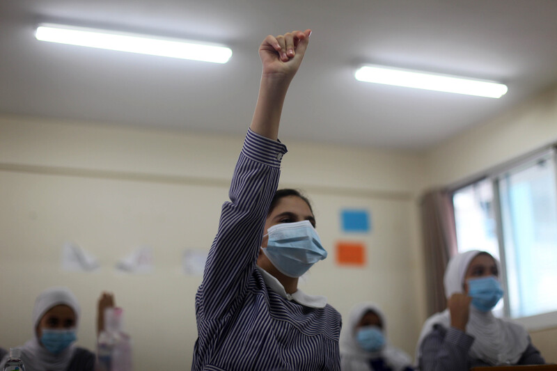 Children seated in a classroom