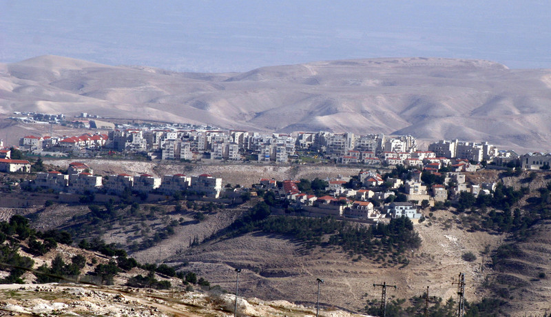 A view of a group of houses on hilltops