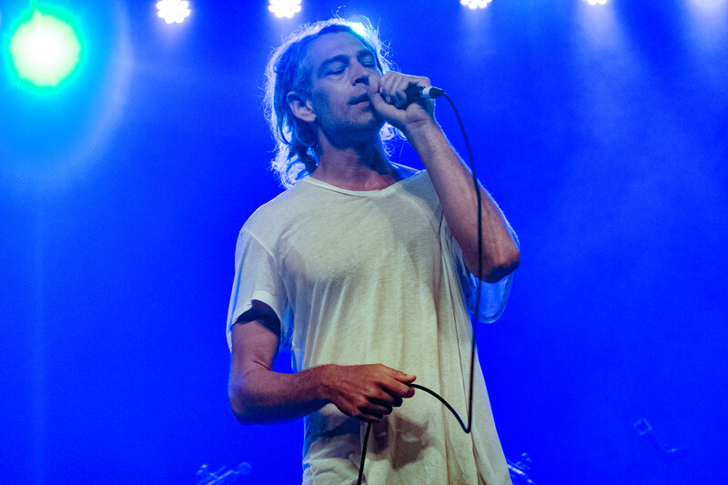 Singing man holding microphone