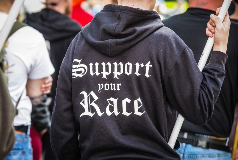 Man wears sweatshirt with racist slogan