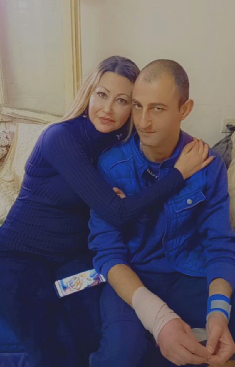 Woman embraces man