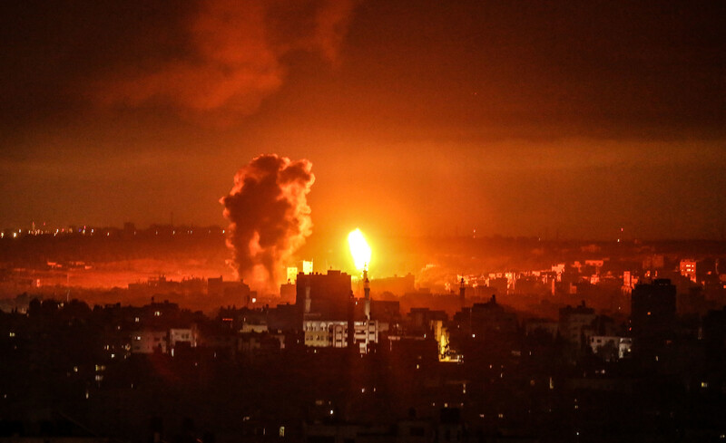 Fire rises from buildings 