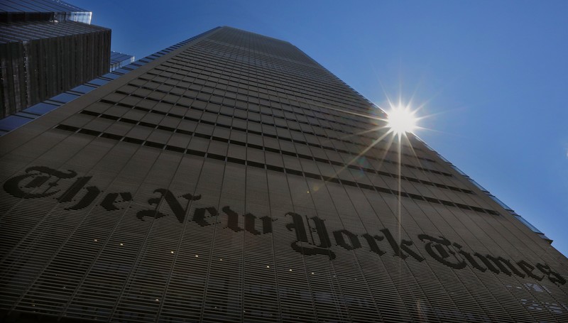 Sun shines behind New York Times building