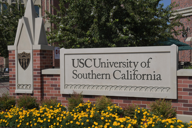A sign in front of the USC campus