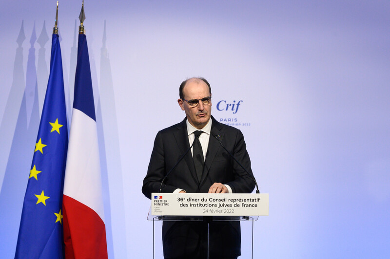 Man in suit at podium