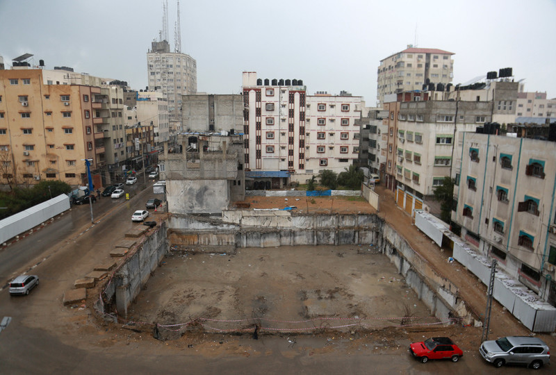 A space between housing blocs marks the place where al-Jawhara Tower used to stand