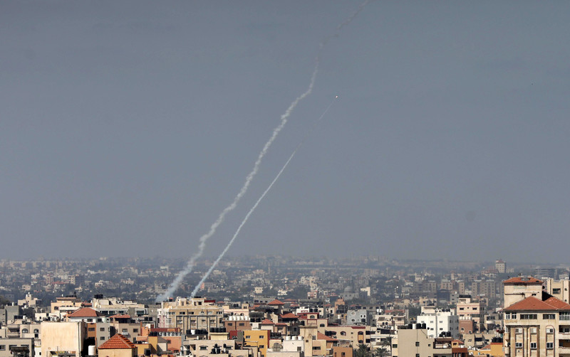 Palestinian fighters launch rockets towards the Mediterranean sea during a drill in Gaza City, 20 June. (Ashraf Amra/ APA images)