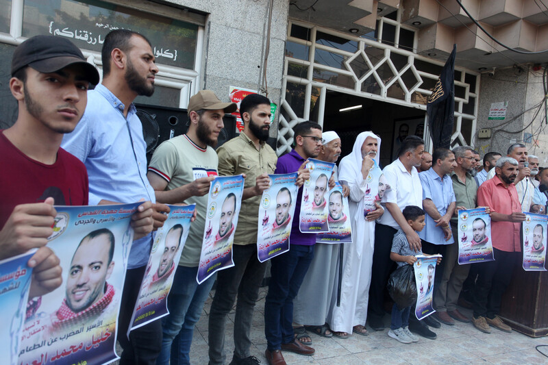 Palestinians in Gaza protest in solidarity with Palestinian prisoners on hunger strike in Israeli jails on 28 June. Israel is currently holding some 640 Palestinians without charge or trial under indefinitely renewable administrative detention orders, according to the human rights group Addameer.  (Omar Ashtawy/ APA images)