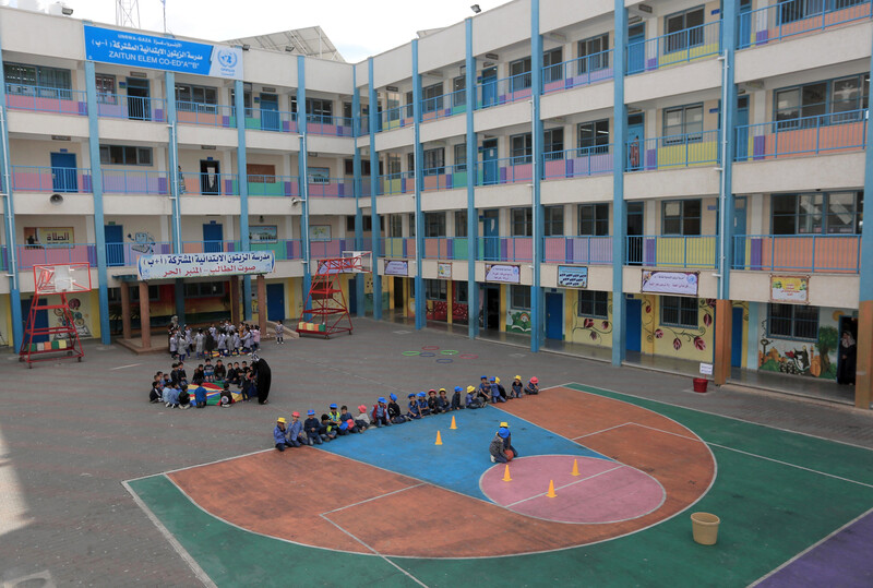 Children gather in the courtyard of an UNRWA school in Gaza