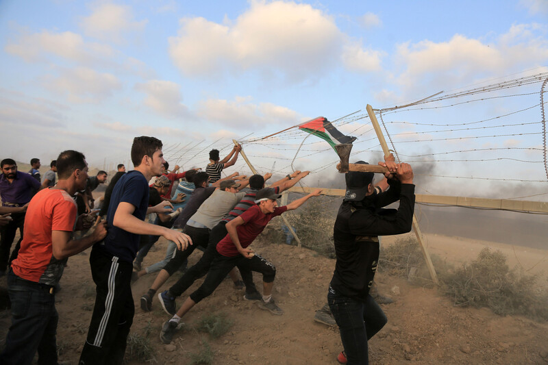 Palestinian youths attempt to tear down Gaza-Israel boundary fence