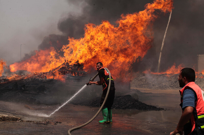 Firefighters tackle a blaze