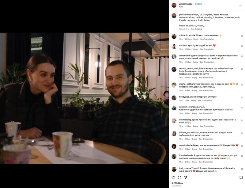 A woman and man in a restaurant