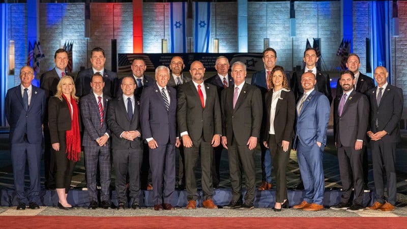 Members of US congressional delegation stand with Knesset Speaker Amir Ohana