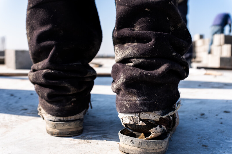 A pair of worn out shoes